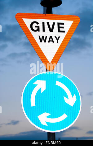 Give way sign roundabout Stock Photo