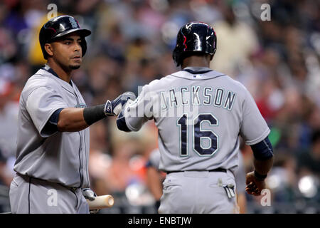 Seattle Mariners' Nelson Cruz holds his bat in the dugout during the fifth  inning of a baseball game against the Los Angeles Angels Saturday, April 8,  2017, in Anaheim, Calif. (AP Photo/Jae