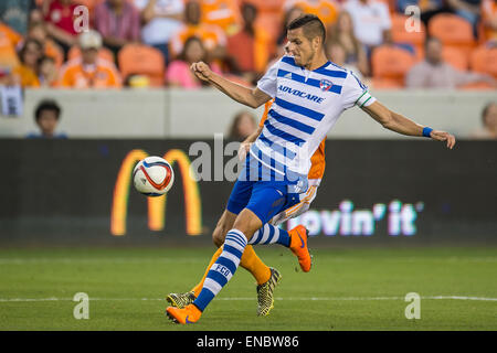 Houston, Texas, USA. 1st May, 2015. FC Dallas defender Matt Hedges (24) controls the ball during an MLS game between the Houston Dynamo and FC Dallas at BBVA Compass Stadium in Houston, TX on May 1st, 2015. Dallas won the game 4-1. Credit:  Trask Smith/ZUMA Wire/Alamy Live News Stock Photo