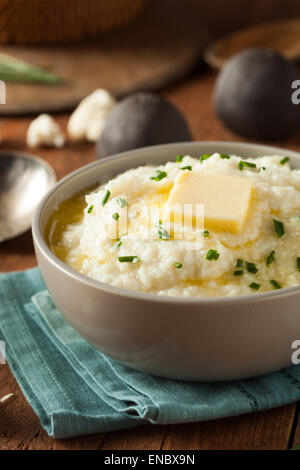 Homemade Organic Mashed Cauliflower with Butter and Chives Stock Photo