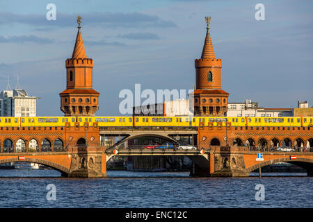 Oberbaumbrücke, a bridge over river Spree, subway, local trains, tram, using the bridge, Berlin, Stock Photo