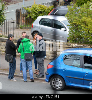 Manchester  UK  2nd May 2015 Lib Dem Parliamentary Candidate, John Leech, wearing a green cagoule, briefs his supporters as they meet in a Didsbury street before delivering leaflets to houses in the area. John won in 2005 and 2010, but Labour is expected to run them very close this time. The Conservatives are considered to have no chance.  General Election  Campaigning for LbDem in Manchester Withington Credit:  John Fryer/Alamy Live News Stock Photo