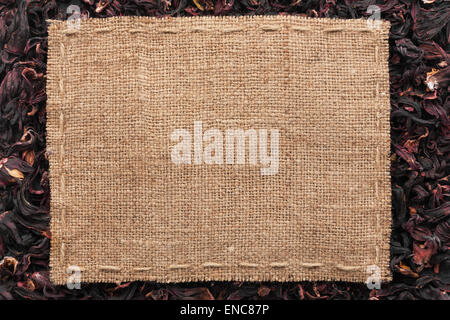 Frame made of burlap with the line lies on  hibiscus, with place for your text Stock Photo