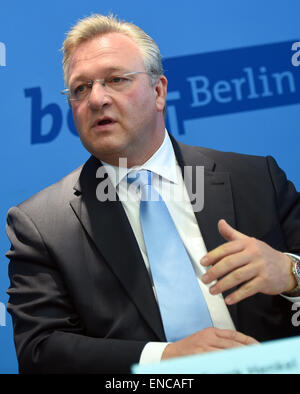 Berlin's Interior Senator Frank Henkel gives journalists an update on the demonstrations on Walpurgis Night and 1 May in Berlin during a press conference in Berlin, Germany, 02 May 2015. PHOTO: BRITTA PEDERSEN/dpa Stock Photo