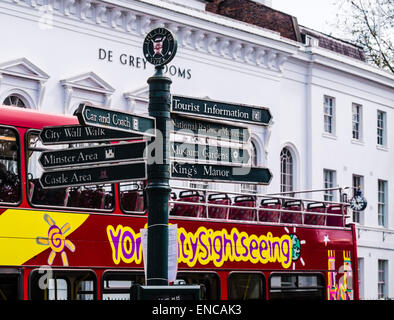 Tourist attractions signpost opposite the De Grey Rooms, St Leonard's Place, York, England, UK Stock Photo