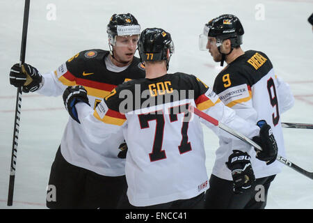 Prague, Czech Republic. 02nd May, 2015. Germany's Michael Wolf (L-R) celebrates his 0-1 goal with Nikolai Goc and Tobias Rieder during the Ice Hockey World Championship match between France and Germany in the O2 Arena in Prague, Czech Republic, 02 May 2015. Photo: ARMIN WEIGEL/dpa/Alamy Live News Stock Photo
