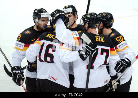 Prague, Czech Republic. 02nd May, 2015. Germany's Michael Wolf (2.f.R) celebrates his 0-1 goal with teammates during the Ice Hockey World Championship match between France and Germany in the O2 Arena in Prague, Czech Republic, 02 May 2015. Photo: ARMIN WEIGEL/dpa/Alamy Live News Stock Photo
