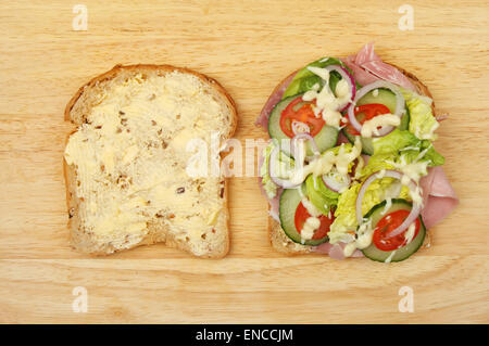 Ham salad sandwich ingredients on a wooden board Stock Photo