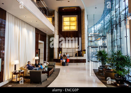 Chicago Illinois,Downtown,Magnificent Mile,Trump International Hotel & Tower,luxury,hotel,five-star rating,condo,lobby,man men male,woman female women Stock Photo