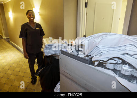 Chicago Illinois,Magnificent Mile,Conrad,hotel,Hilton,hotel chain,luxury,upscale,high-end,guest room,hallway,Black woman female women,housekeeper hous Stock Photo