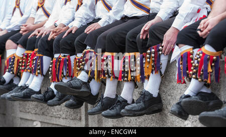 London, UK. 2 May 2015. Participants taking part in the Westminster Morris Men 'Day of Dance' in Trafalgar Square in front of bemused tourists. Morris men groups have come from as far as Brighton and Newcastle to take part in this annual event. Credit:  Stephen Chung / Alamy Live News Stock Photo