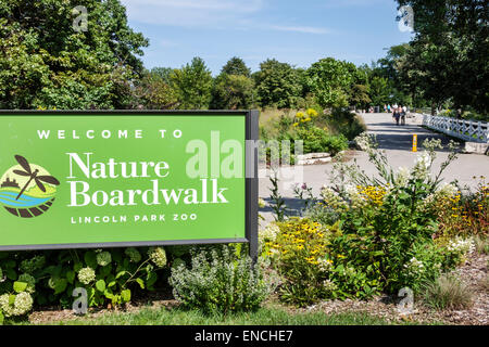 Chicago Illinois,North Side,Lincoln Park,Zoo,public park,sign,entrance,nature boardwalk,garden,flowers,trees,IL140908060 Stock Photo