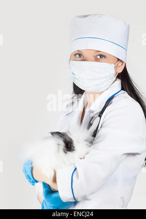 portrait of a doctor with rabbit in hands Stock Photo