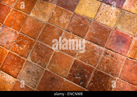 Background of old weathered tiles on the floor Stock Photo