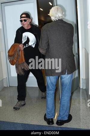 Neil Young arrives at Los Angeles International (LAX) airport  Featuring: Neil Young Where: Los Angeles, California, United States When: 28 Oct 2014 Stock Photo