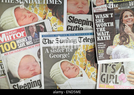 3rd May, 2015. A selection of British Sunday newspapers (3rd May 2015) report the birth of a baby girl to the Duke & Duchess of Cambridge in London UK.  The new Princess was born at 8.34am on Saturday 2nd May 2015 and weighed 8lbs and 3oz. Credit:  Maurice Savage/Alamy Live News Stock Photo
