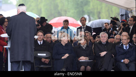 Dachau, Germany. 3rd May, 2015. German Chancellor Angela Merkel (L), President of the Israelite Cultural Community of Munich and Upper Bavaria Charlotte Knobloch (C) and Bavarian Prime Minister Horst Seehofer (R) attend the commemoration event marking the 70th anniversary of the liberation of Dachau concentration camp by Allied Forces, at the former camp in Dachau, Germany, 03 May 2015. More than 200,000 people from across Europe were interned under dire conditions at Dachau. PHOTO: dpa/Alamy Live News Stock Photo