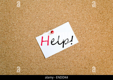Sticky Note On Cork Board Background Help Concept Stock Photo