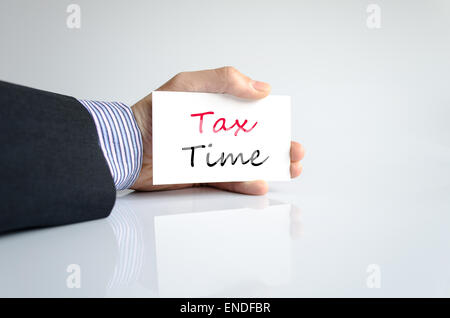 Bussines man hand writing Tax Time Stock Photo