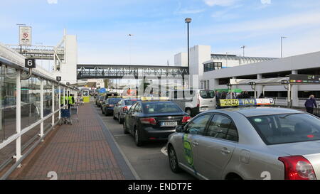 A line of taxis waits at a rank at Dublin airport during a day of industrial action by drivers at Dublin Bus and Bus Eireann. Stock Photo