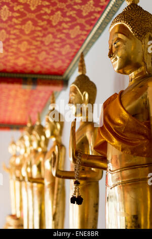 Golden Buddha statues at Wat Pho Buddhist temple, Bangkok, Thailand, Asia Stock Photo