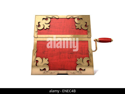 An ornate antique closed jack-in-the-box mad of red wood and gold trimmings on an isolated white studio background Stock Photo