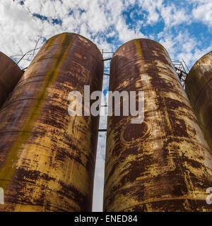 Big old deserted rusty tanks Stock Photo