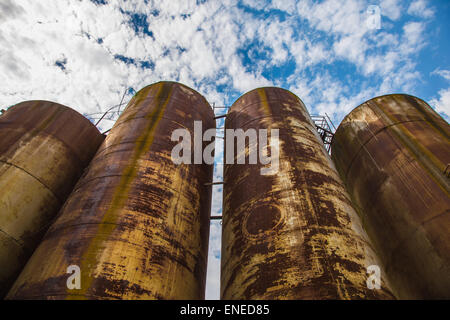 Big old deserted rusty tanks Stock Photo