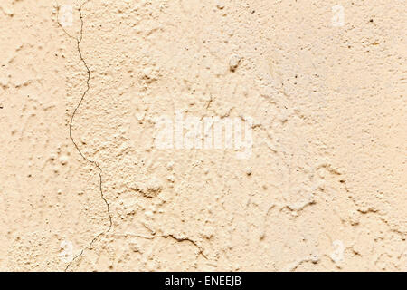 Grunge plaster cement or concrete wall texture light yellow color Stock Photo