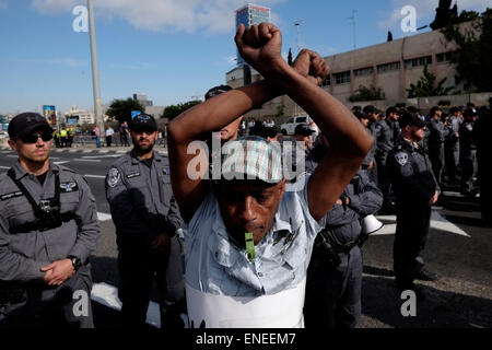 Tel Aviv - Israel, 03.05.2015 Members of the Beta Israel community also known as Ethiopian Jews protesting in Tel Aviv against racism within Israeli society and police brutality on 03 May 2015. Violence engulfed in central Tel Aviv on Sunday night, as an anti-police brutality protest by Ethiopian-Israelis spun out of control, with protesters throwing rocks and bottles at police who fired stun grenades and charged the square repeatedly on horseback. Stock Photo