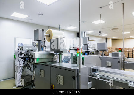 Automatic packing line of conveyor on pharmaceutical industry manufacture or chemical plant Stock Photo