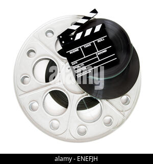 Movie clapper on 35 mm cinema film reels isolated on white background square frame Stock Photo