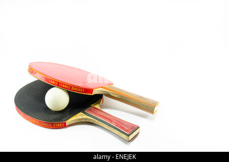 Two ping-pong rackets and a ball isolated on white Stock Photo