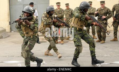 Angolan marines demonstrates close quarter battle techniques during a training session with U.S. Marines March 4, 2015 in Luanda, Angola. Stock Photo