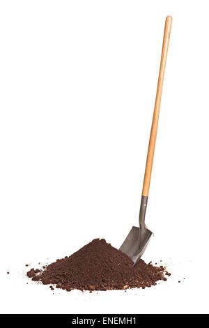 Vertical studio shot of a shovel stuck in a pile of dirt isolated on white background Stock Photo