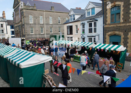 Aberystwyth Wales UK, Monday 04 May 2015  A street market in Aberystwyth as the town celebrates being officially crowned a “Great Town” at the prestigious Academy of Urbanism 2015 Awards.   Aberystwyth picked up the Great Town award for its leading work in promoting its location, economy and community.    Credit:  keith morris/Alamy Live News Stock Photo