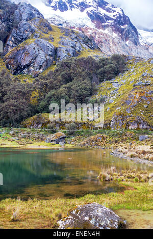 Lake and snowy mountain in the Cordillera Blanca near Huaraz, Peru Stock Photo