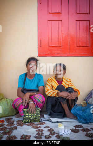 Local women sell sirih pinang on a street vendor in Sumba Island, Indonesia. Stock Photo