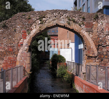 Norman arch over water Reading Abbey remains Berkshire England UK Stock Photo