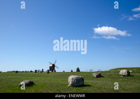 Old windmill and an old graveyard from the viking age at Gettlinge on the swedish island Oland Stock Photo