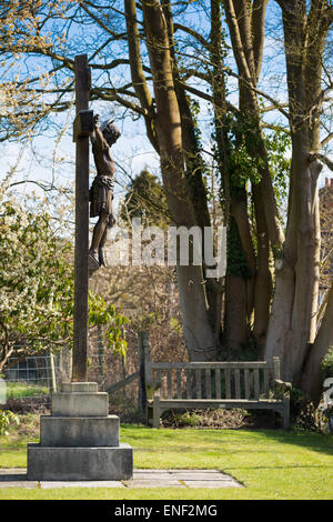 An oak Crucifix commemorating Pirbright men who died in both World Wars. Stock Photo