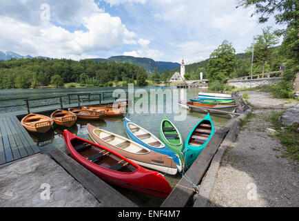 Lake Bohinj (Bohinjsko jezero), Triglav National Park, Upper Carniola, Slovenia.  Canoes for rent.  Ribcev Laz. Stock Photo