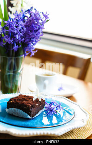 Festive table setting with blue flowers closeup Stock Photo