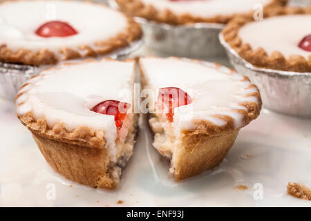 Cherry Bakewell tart close-up cut in half Stock Photo