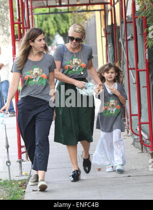 Cougar Town star Busy Philipps out in West Hollywood with family all wearing matching grey t-shirt portraying a flamingo and dog in jewelry t-shirt  Featuring: Busy Philipps Where: Los Angeles, United States When: 30 Oct 2014 Stock Photo