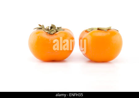 two persimmon isolated on white background Stock Photo