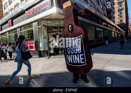 New York, NY 2 May 2015 - Man dressed in a wine costume to promote a local liquor store. Stock Photo