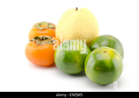 chinese pear persimon and green orange isolated on white background Stock Photo