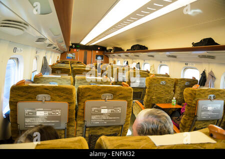 Inside of a modern, comfortable high speed train / bullet train / shinkansen interior. Stock Photo