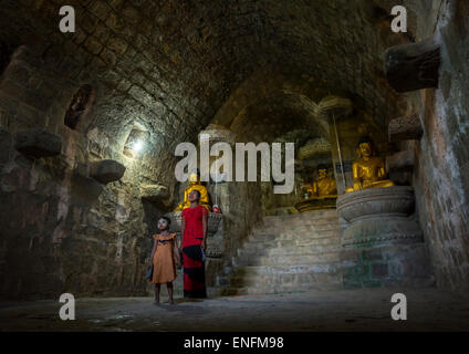 Children Inside Htuk Kant Thein Temple, Mrauk U, Myanmar Stock Photo